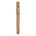 OMAS "MILORD" FOUNTAIN PEN.Wooden barrel and silver ornamentation.Limited edition.Nib in 18 kts