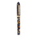 CONKLIN "NOZAC WORLD GAUGE" FOUNTAIN PEN.Blue and brown marbled acryloid (resin and celluloid)