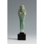 Ushebti for Ipethemetes. Egypt, Saite period, 6th century BC.Green faience.Measurements: 14.5 cm (