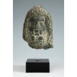 Head of Serapis; Egypt, Late Antiquity 664-323 BC.Shale.Good state of preservation.Provenance: