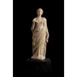 Female figure representing Venus. Rome, 2nd-3rd century AD.White marble.Size: 31 cm (height); 6 x