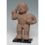 Sacrificer statue; Costa Rica, Guápiles Region, Huetar Civilisation, AD 1000-1500.Basalt.It has