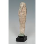 Ushebti; Egypt, Lower Egypt, 664-332 BC.Fayenza.It has losses in the glaze.Measurements: 19 x 5 x