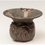 Figurative vessel from the Paracas culture; Peru, 700-300 BC.Polychrome terracotta.Attached
