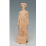 Large female statue; Greece, Boeotia, 5th century BC.Polychrome terracotta.The polychromy is missing