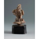 Eagle hunting a snake. Smyrna, 3rd century BC.Terracotta.Provenance: Smyrna, 1895-1905. Collection