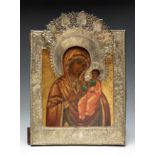 19th century Russian icon."Virgin Odighitria".Painting on wood. Oklad of gilded silver.Contrasts