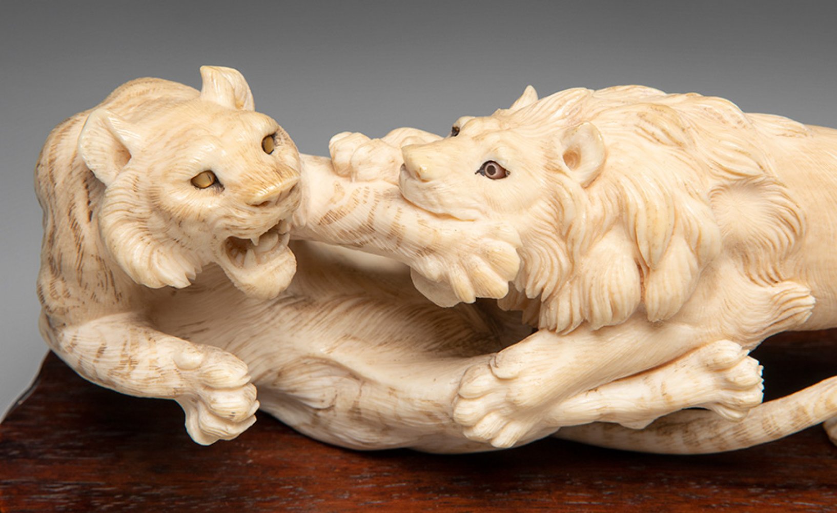 Enraged beasts. Japan, Meiji period, 19th century.Signed on the reverse.On carved wooden base.Weight - Image 3 of 5