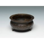 Small censer. China, 18th century.Bronze.With seal on the base.It presents damages in the mouth.
