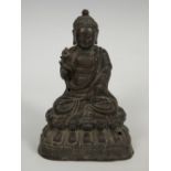 Buddha. China, Ming Dynasty, 1368-1644.Metal.It has a perforation.It shows inscriptions on the