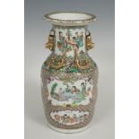 Vase. China, Canton, 19th century.Enamelled and polychrome porcelain. Pink family.The gilding is