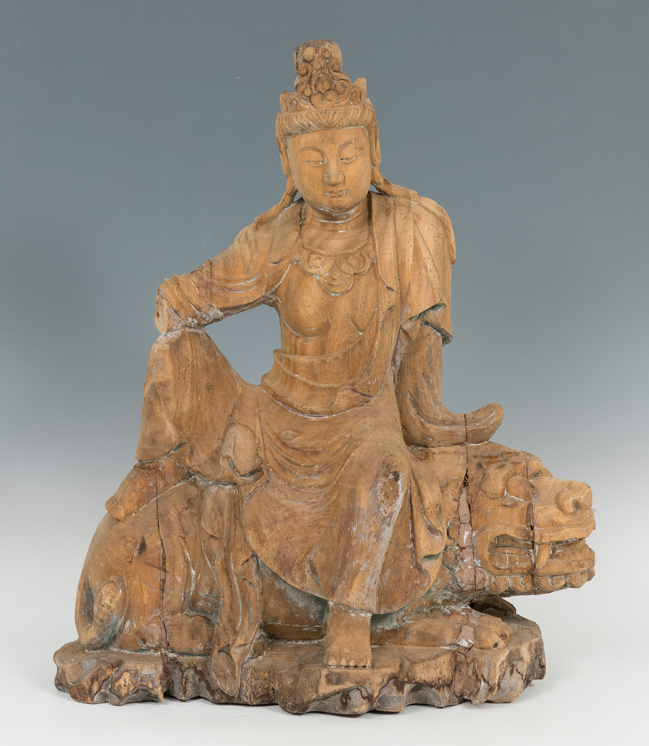 Buddha. China, Qing Dynasty, 19th century.Carved wood.It presents faults in the carving and the loss