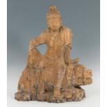 Buddha. China, Qing Dynasty, 19th century.Carved wood.It presents faults in the carving and the loss