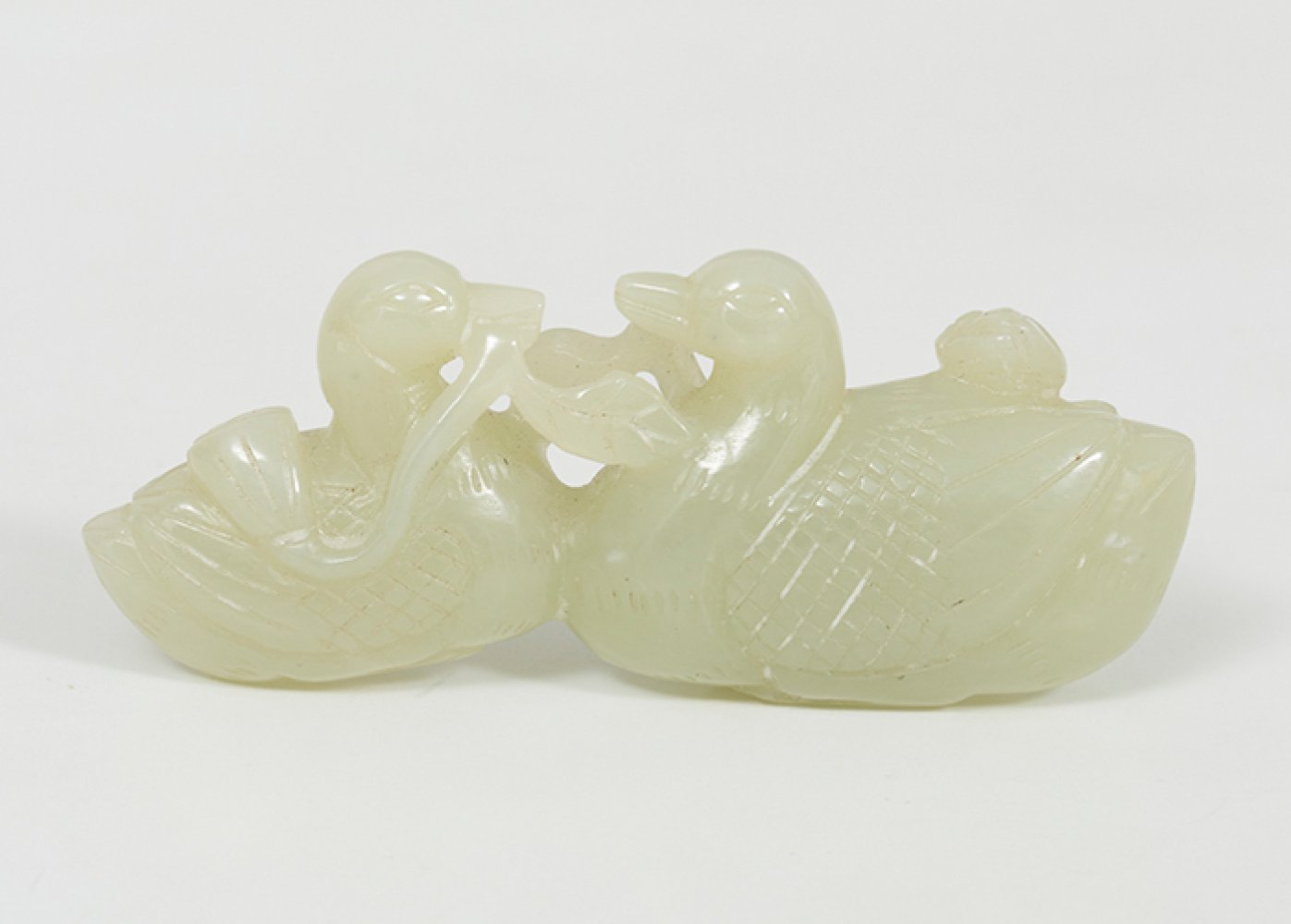 Amulet. China, Qing Dynasty, 20th century.Carved white jade.Measurements: 3.5 x 8 x 1.5 cm.Amulet - Image 2 of 3