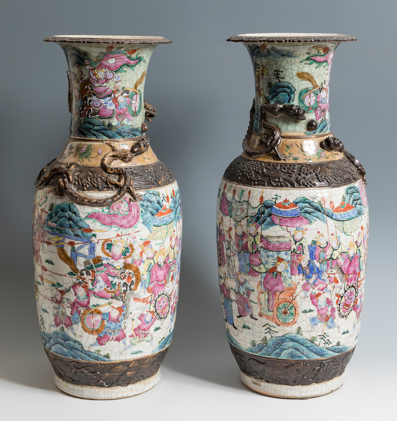 Pair of Chinese vases, late 19th century.Enamelled porcelain and bronze.Stamps on the base.