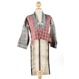 Miao dress; Yunnan, China.Batik, cotton and embroidery.Measurements: 97 cm longDress made in batik