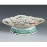 Green Family offering bowl. China, mid-19th century.Enamelled porcelain.It shows wear due to use and