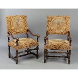 Pair of Louis XIV armchairs. France, 17th-18th century.Walnut wood and petit point upholstery.Use