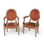 Pair of Louis XVI style armchairs, XIX century.Carved and polychrome wood. Felt upholstery.It