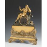Louis Philippe period table clock. France, ca. 1840.Gilt and patinated bronze.Honoré Pons movement.