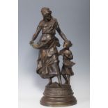 AUGUSTE MOREAU (France, 1834 - 1917)."Mother and daughter".Sculpture in patinated bronze.Signed on