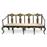 Bench. Aragon, late 18th century.In polychrome wood.Measurements: 220 x 50 x 100 cm.Aragonese