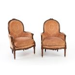 Set of two Louis XVI armchairs, second half of the 18th century, and a matching footrest of later