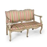 French sofa Louis XV style, early 19th century.Carved and polychrome wood.The fabric upholstery is