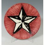 Dish; MANOLO CÁCERES (Spain, 1952)."Red Star. Revolution series, 2000.Talavera ceramic.Measurements: