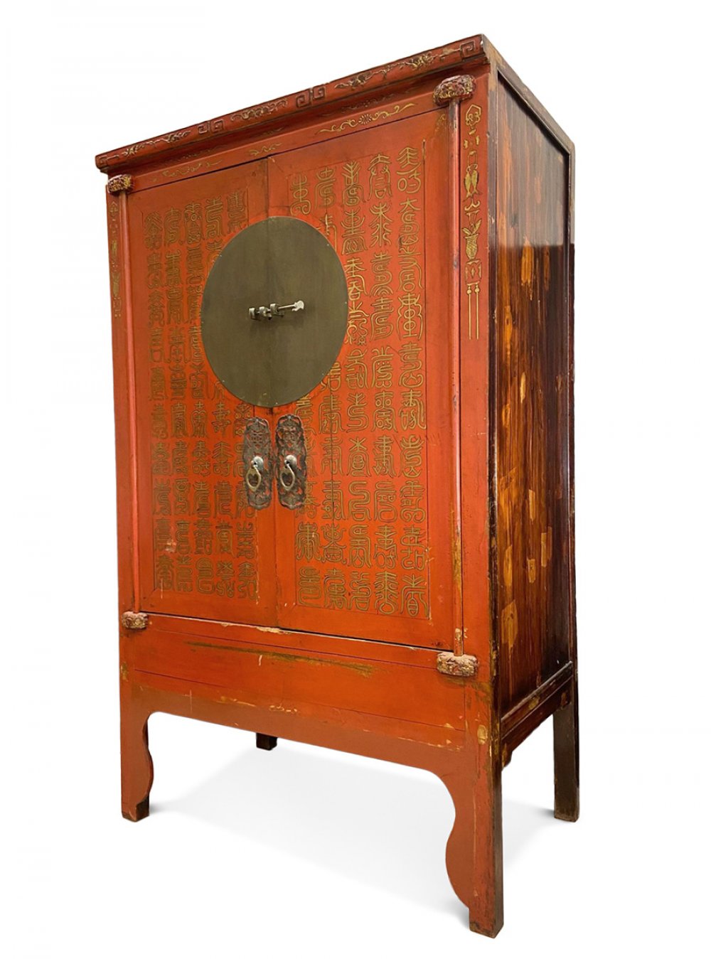 Cabinet. China, late 19th-early 20th century.Red lacquered elm wood with hand-decorated gold dust.