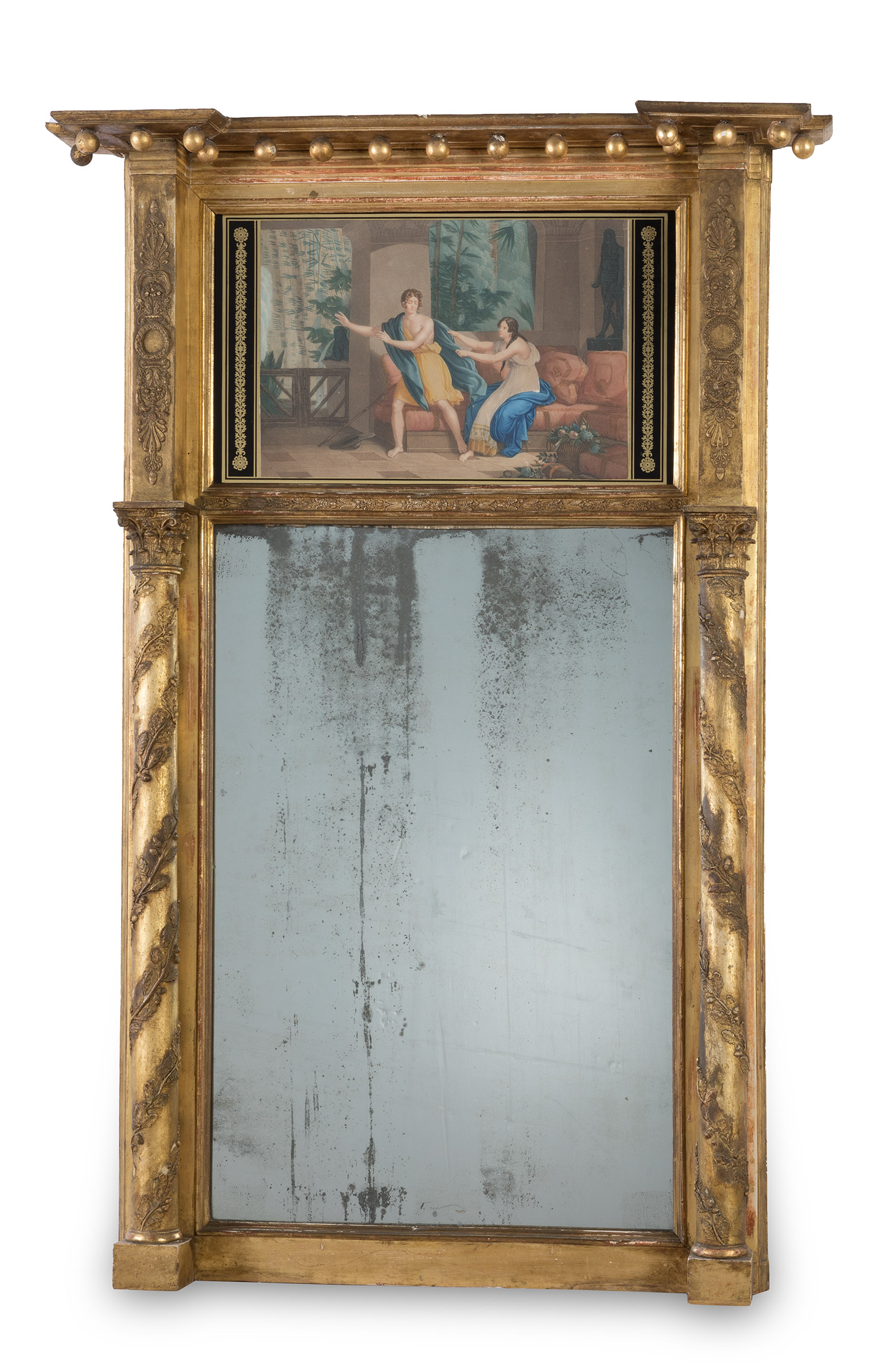 Trumeau mirror. France, 18th century.Carved and gilded wood.With period engraving on the top.