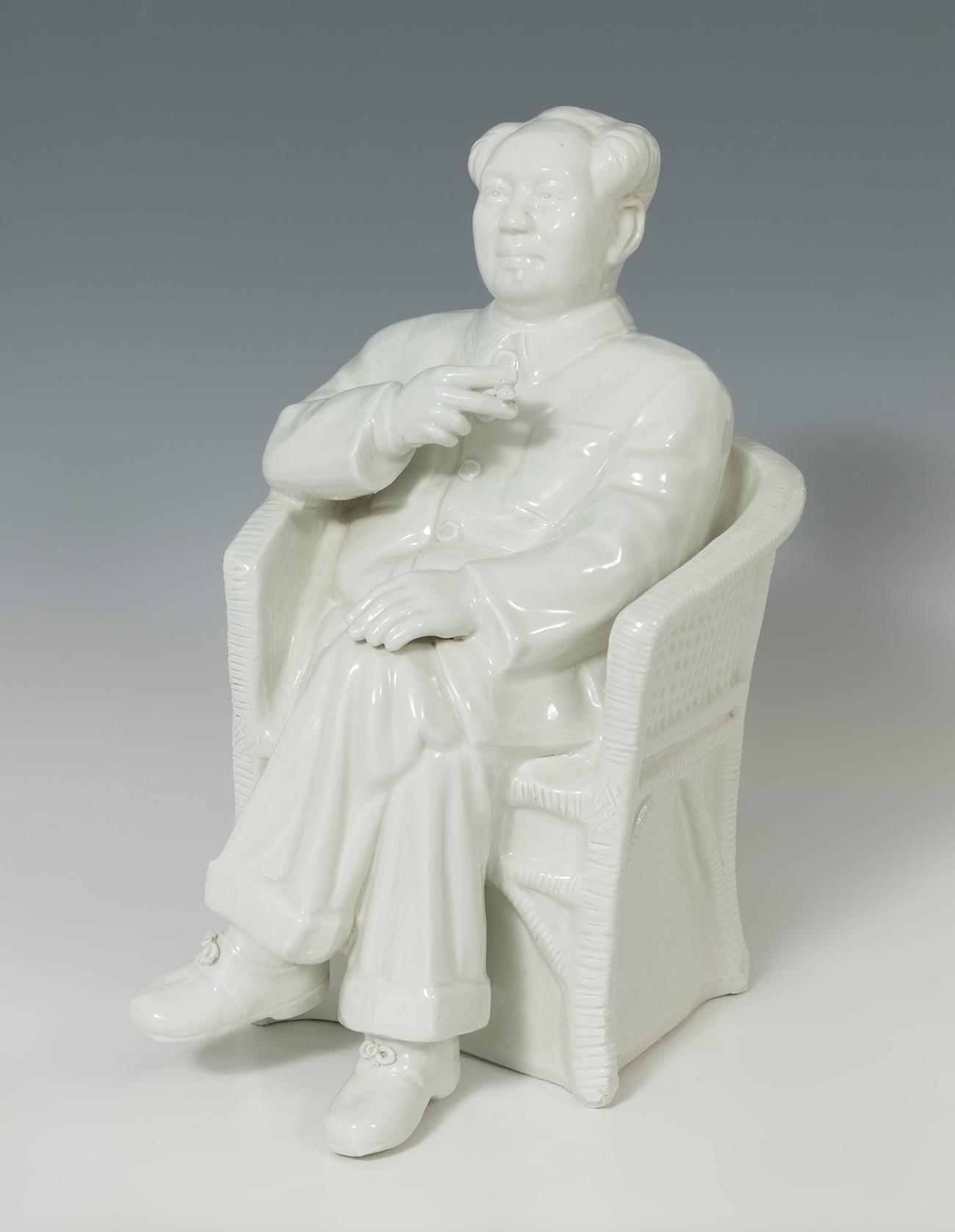 Sculpture of Mao Zedong, 20th century.Glazed biscuit porcelain.Size: 45 x 21 x 24 cm.Mao Zedong