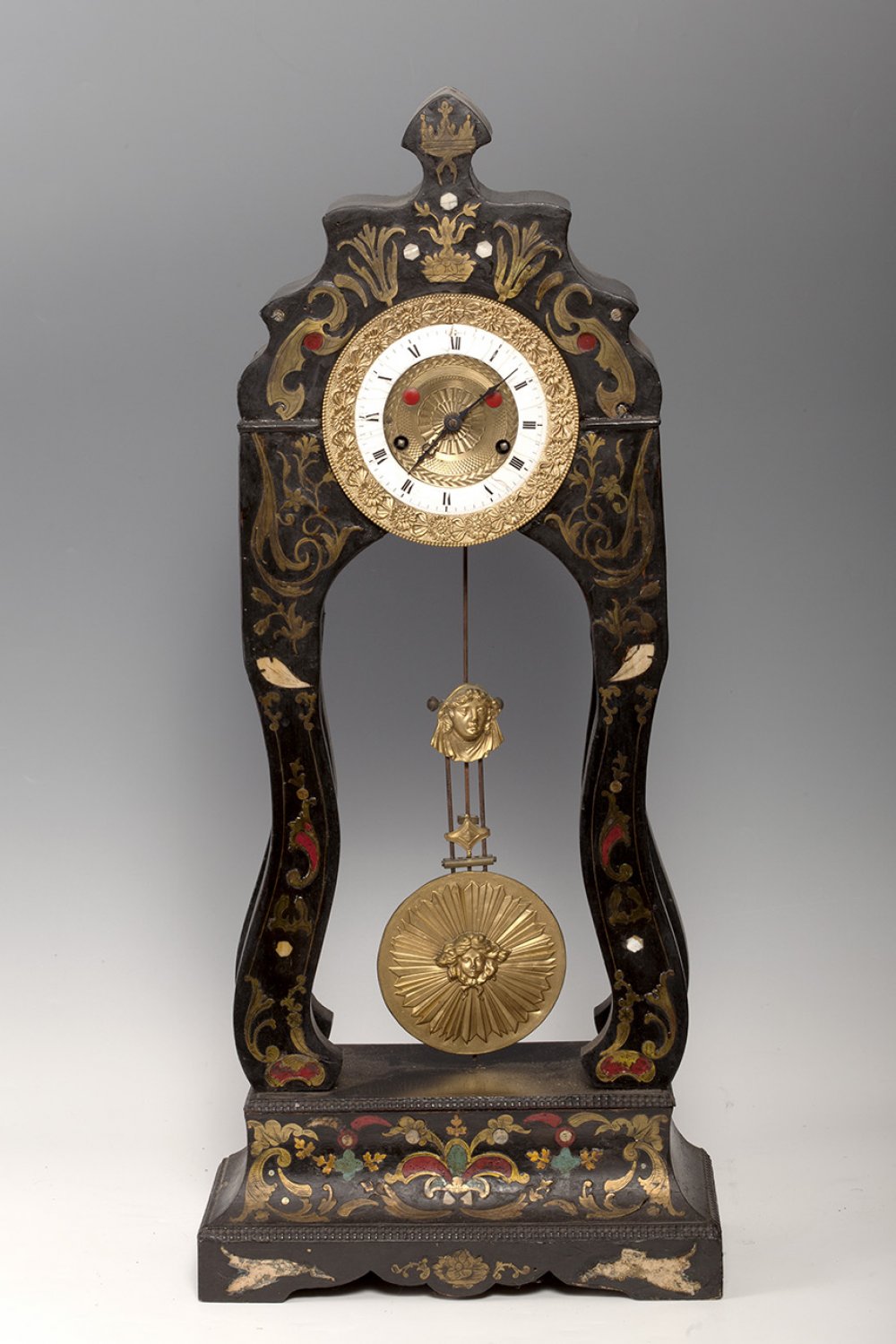 French school 19th century.Table clock.Chicaranda, metal and marquetry of metal and semi-precious