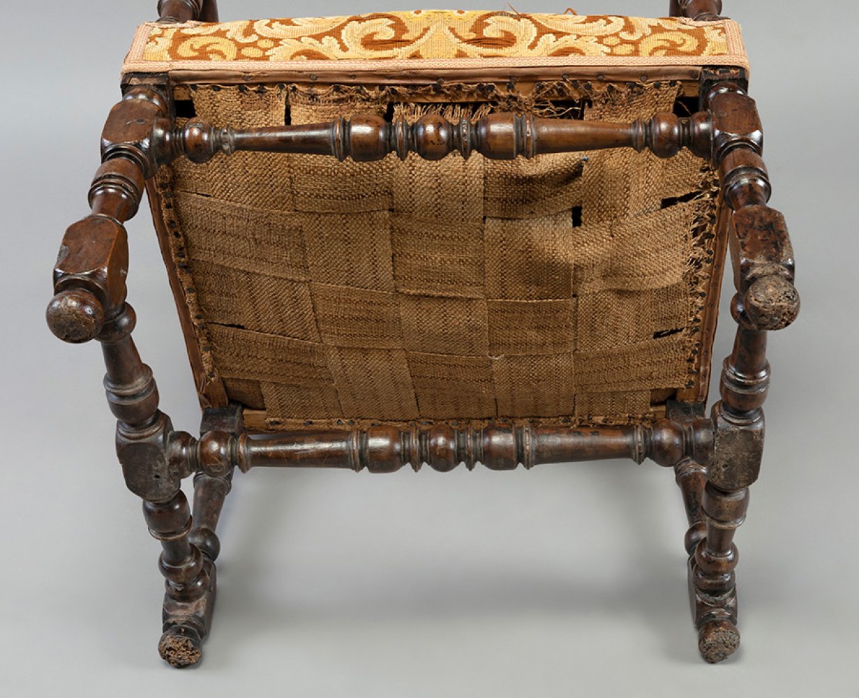 Pair of Louis XIV armchairs. France, 17th-18th century.Walnut wood and petit point upholstery.Use - Image 3 of 7