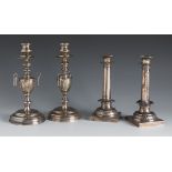 Two pairs of French style candlesticks, late 19th century.Silver.Some dents. Initials engraved on