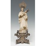 School of Trapani; 17th century."Madonna and Child".Polychrome alabaster, gilt and silver.It