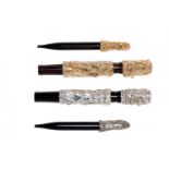 FOUNTAIN PENS WITH CONCEALED SYSTEM.Resin, silver and gold plated barrels.Nib in 18kt gold.No box.
