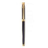 ÉLYSÉE FOUNTAIN PEN.Gold-plated steel barrel and blue lacquer.Limited edition.Two-tone 18 K gold