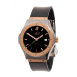 HUBLOT Automatic watch ref. 1915.7, n. 6693XX, for men/Unisex.Case in steel and yellow gold.