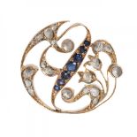 Brooch in yellow gold, sapphires and diamonds.19th century. Round model with naturalistic-inspired