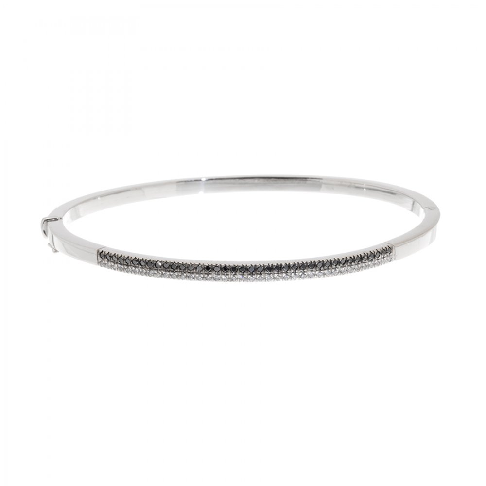 Rigid bangle bracelet in 18 carat white gold. Frontis with double line of diamonds, brilliant cut,