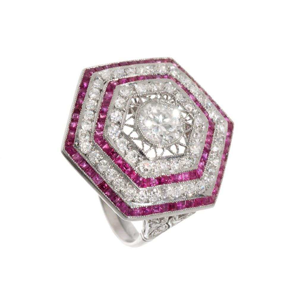 Ring in platinum, diamonds and rubies. Art deco" model, with hexagonal frontispiece with central