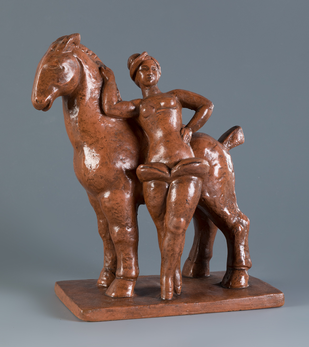 VADIM ANDROUSOV (St. Petersburg, 1895-1975)."Circus Acrobat".Patinated terracotta.Signed on the
