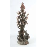 Große Münzfigur einer Schutzgottheit