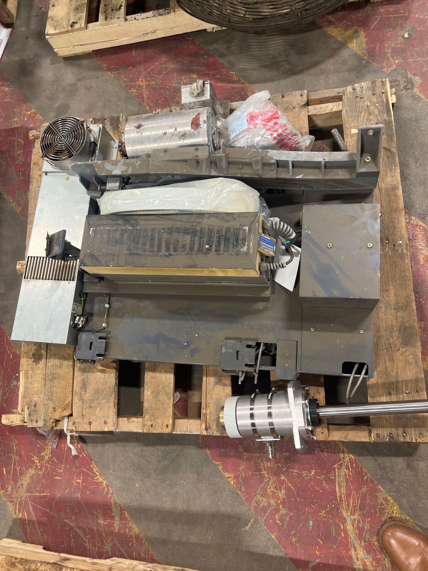 pallet of motors and electrical boxes