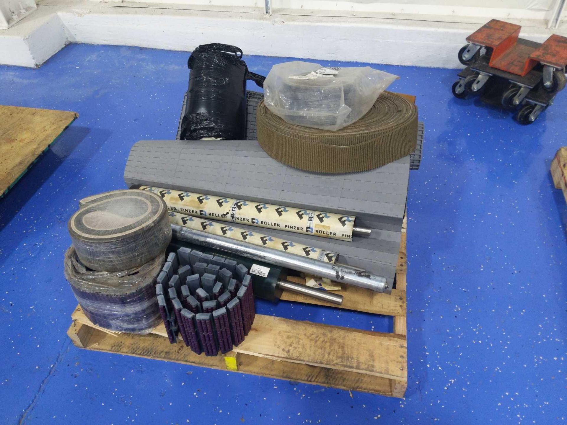 Pallet of Various Conveyor Belts and Rollers