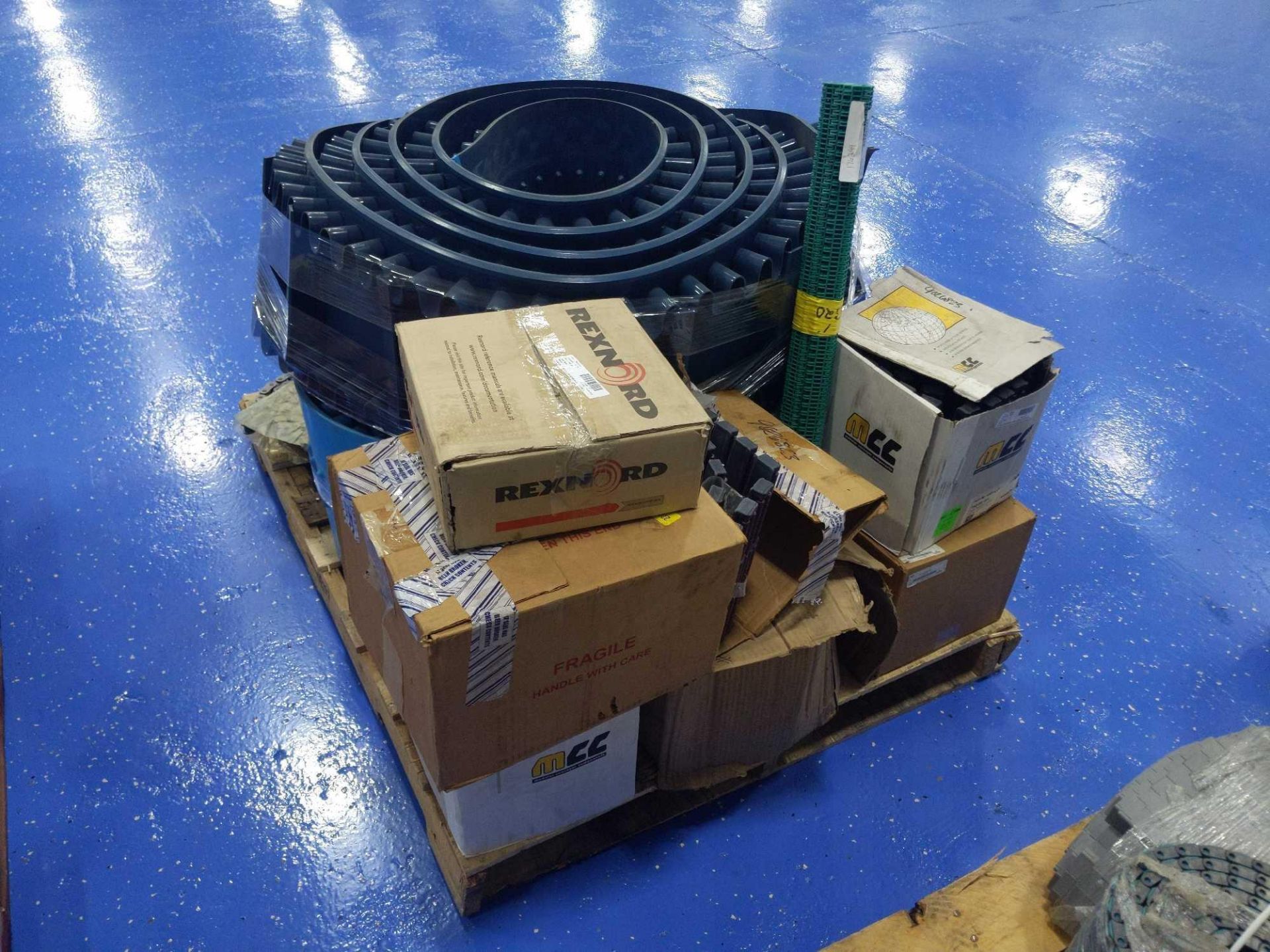 Pallet of Various Conveyor Belts and Parts