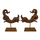 17th Century, A pair of carved wooden dolphins
