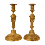 French, 18th Century, A pair of Restauration ormolu candlesticks