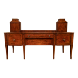 Irish, 18th Century, A large mahogany ebony strung sideboard with matching cutlery towers and a revo
